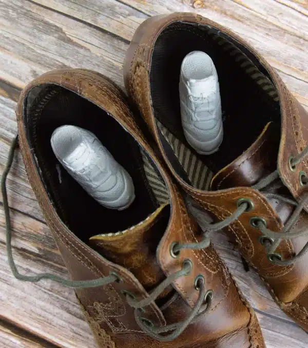 image of stinky feet inside leather brown shoes