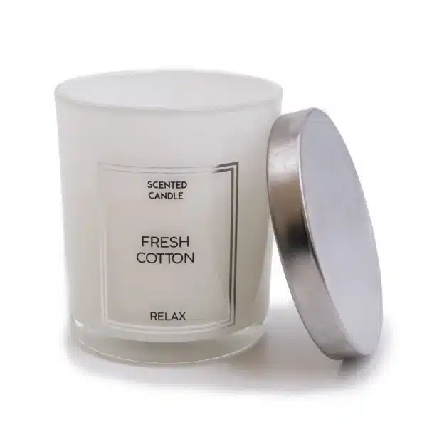 white glass jar with a silver jar saying Fresh Cotton Scent