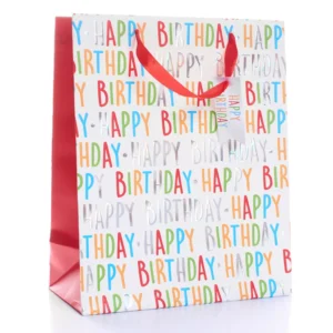 Medium Happy Birthday gift bag with colourful foil text, red satin handles, and matching gift tag — perfect for birthdays and celebrations.