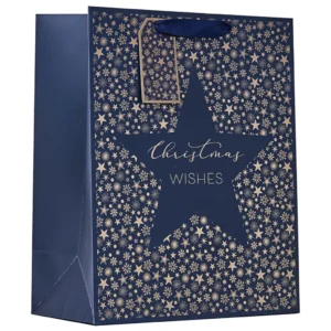 Small navy Christmas Wishes gift bag with gold foil star pattern, matching tag, and ribbon handles — elegant and festive for small gifts.