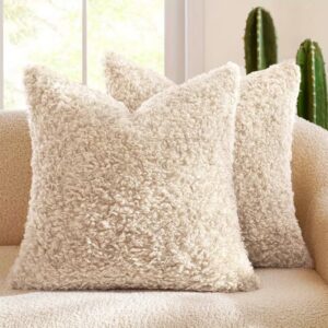 Neutral teddy texture cushion with a soft plush finish, styled on a sofa