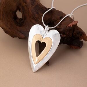 vintage heart pendant necklace with distressed finish on long chain