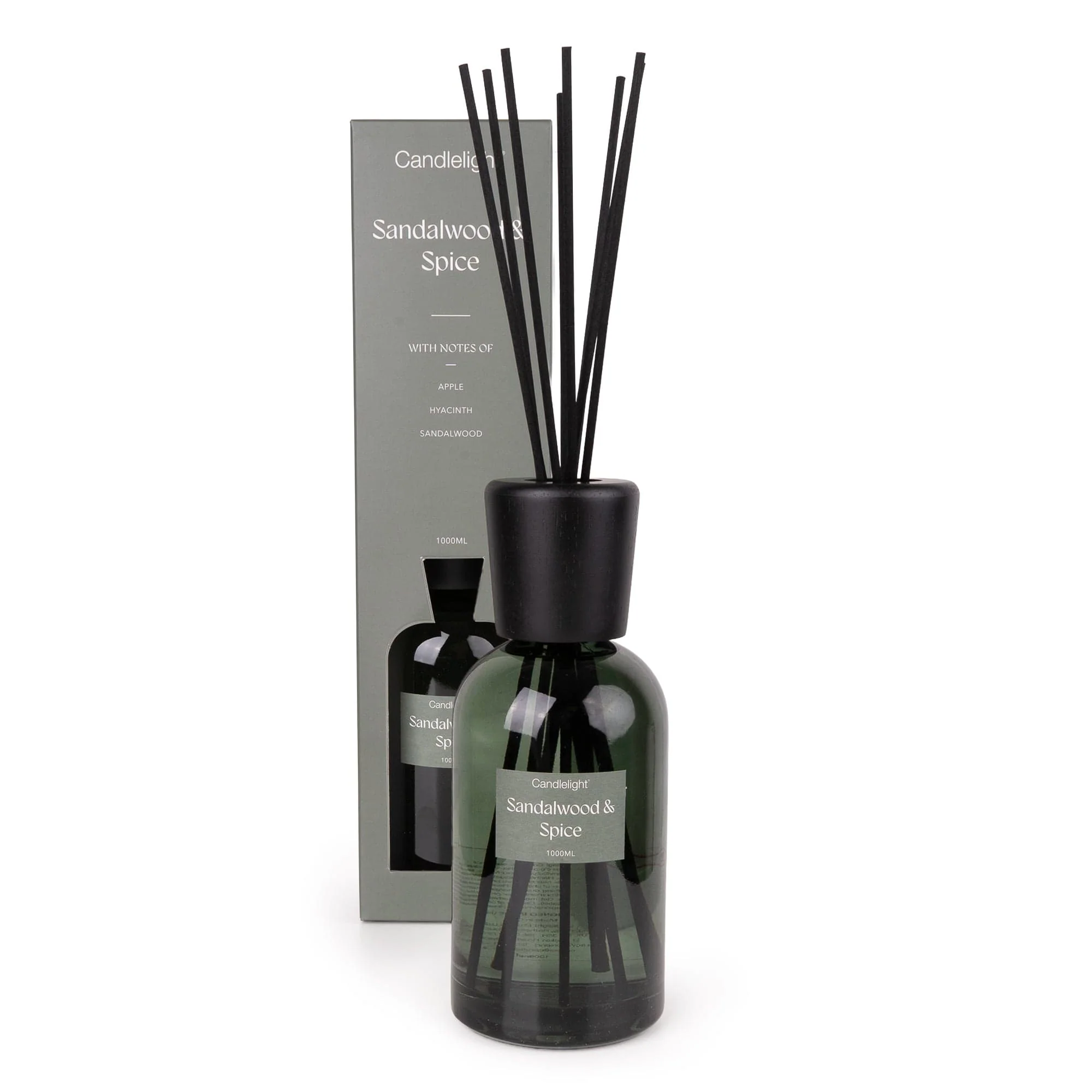 Large 1000ml Sandalwood and Spice reed diffuser in green glass bottle with black reeds