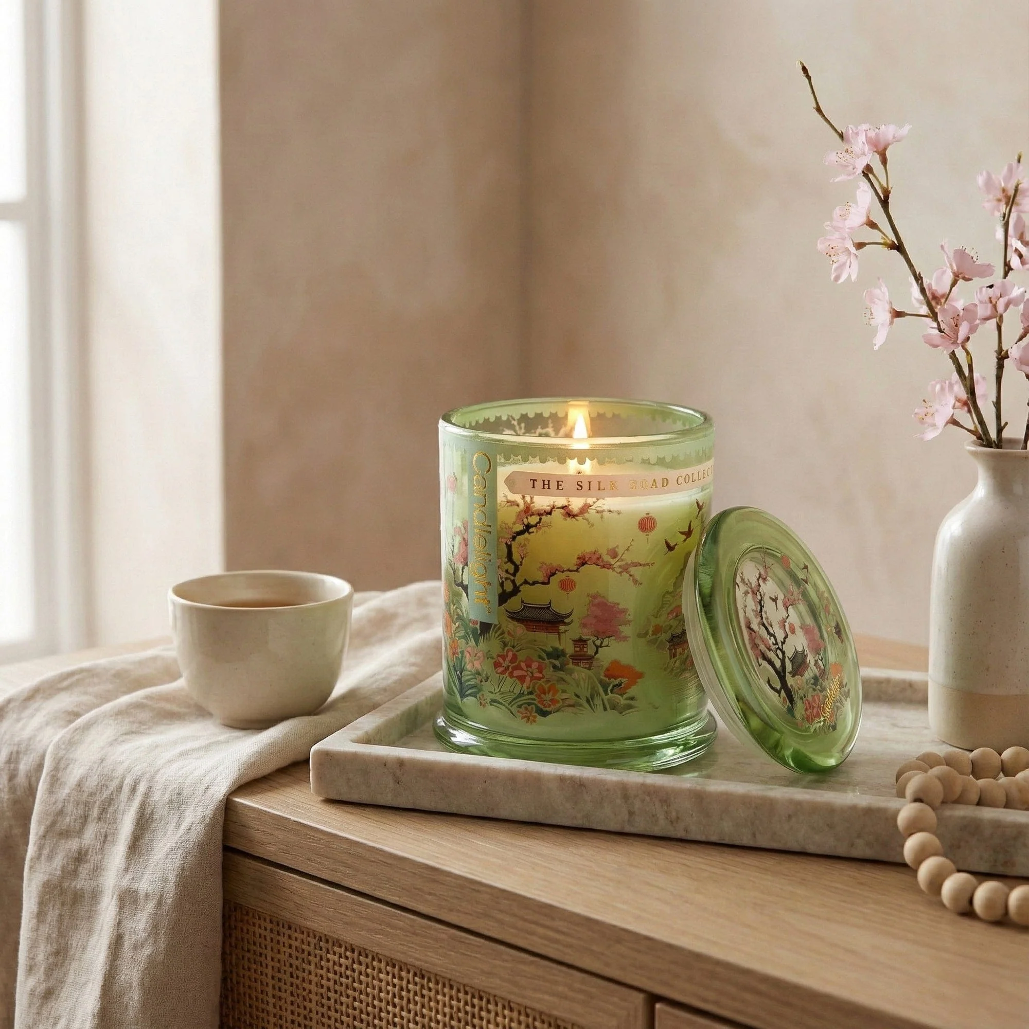 Chengdu large green glass candle with decorative Silk Road Collection artwork and matching lid