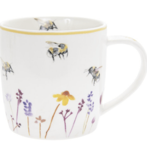 Busy Bees ceramic mug with bee and wildflower design.