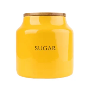 Store sugar in style with this yellow ceramic storage jar featuring a natural bamboo lid. A practical and decorative kitchen accessory from the Tomato Collection.