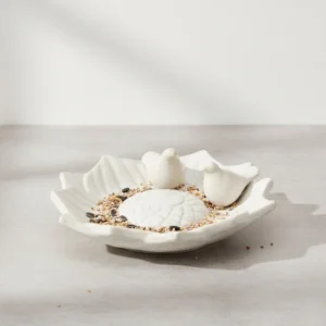 Flower shaped ceramic bird feeder and bird bath with two decorative birds