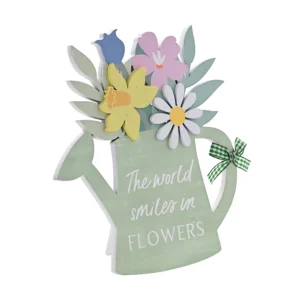 Wooden watering can plaque with flowers and The World Smiles In Flowers sentiment